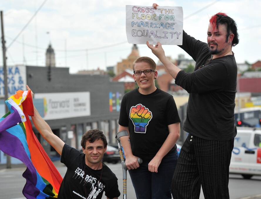 Koby Bunney, Kirsten Holden, Garth Horsfield from the Ballarat Pride Hub inc at the Pride March in Ballarat earlier this year. Picture: Lachlan Bence. 