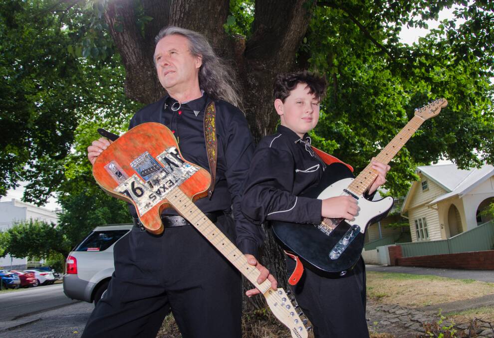 Born to rock: Father and son team Robert and Roy Darby share a love of performing classic rock and roll music. Picture: Victoria Stone-Meadows. 