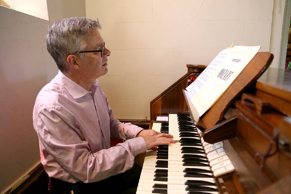 Douglas Mews at the organ in Christ Church, Castlemaine