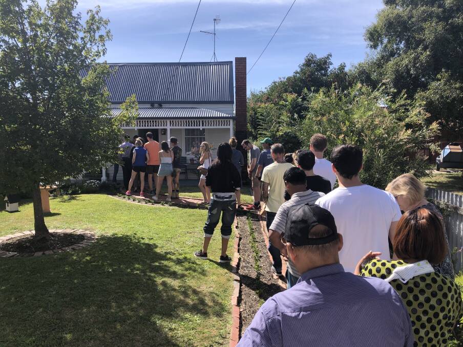 Buyers line up from the front door to the street for an open house in Ballarat North.