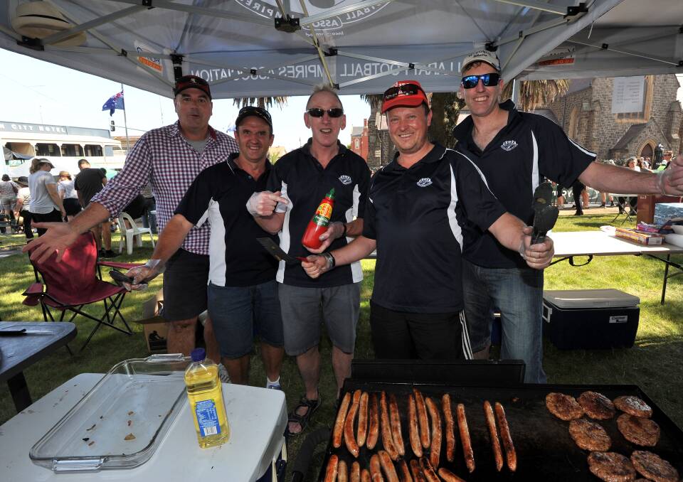 The team from Ballarat Umpires Association Paul Clark, Peter Brown, Riul McLuskey, Peter Every and Justin Davey kept the snags coming for the hungry crowd. 