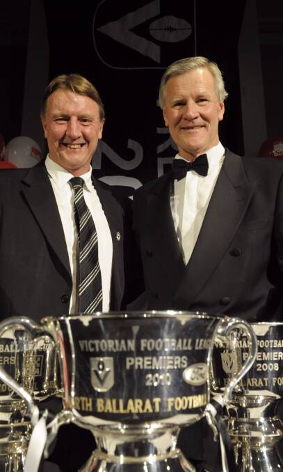 success: Roosters coach Gerard FitzGerald with then-club chairman Peter Wilson and the Roosters' three VFL premiership cups (2008, 2009, 2010).