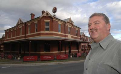 G MOVE: Publican Robert Gayton proudly stands outside the City Oval Hotel.