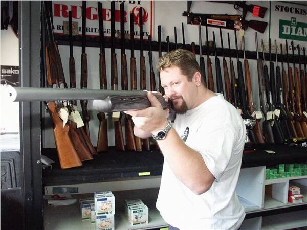 Darren Ellis in a file photo taken in 2002 when he worked in a local gun shop.