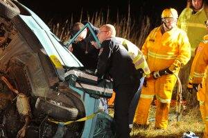 SCENE: Emergency service crews work to free the driver of a vehicle involved in a head-on collision on the Sunraysia Highway at Miners Rest on Saturday night. Picture: Lachlan Bence