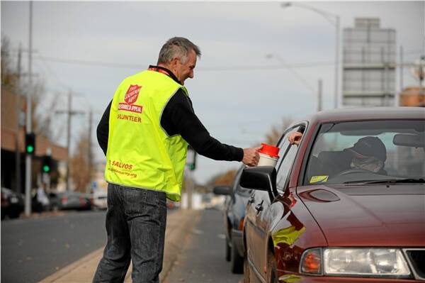GENEROUS: Ian Tournier was kept busy collecting donations for the Salvation Army on the corner of Sturt and Doveton streets on Saturday morning.