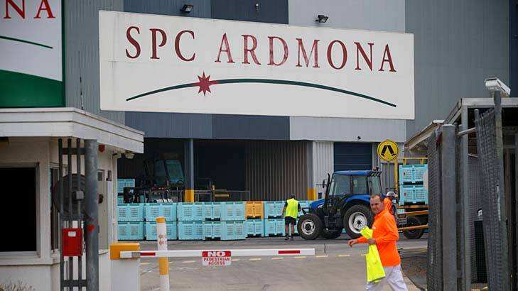 SPC Ardmona factory in Victoria: The company is being urged to cut its workers' pay. Photo: Jason South