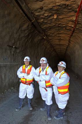 IN THE DARK: Taking part in the Ballarat Goldfields mine tour are, from left, Paul, David and Marie Wynack. INTO the dark underbelly of Ballarat they went,