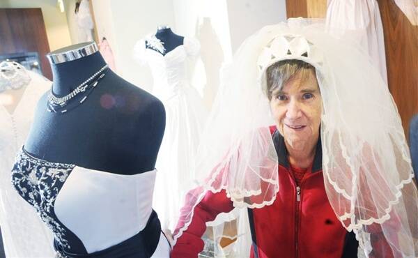 LOOKING GOOD: Queen Elizabeth Centre resident Edna Gaylor gets ready for the royal wedding.