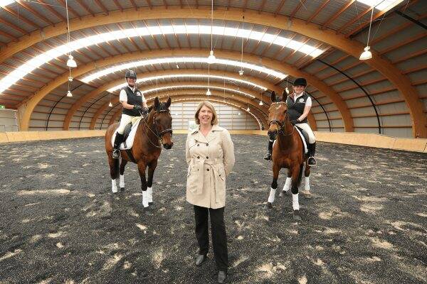Horse riders Rebecca Kinna and Kim Parker with Federal Member for Ballarat Catherine King inside the new equestrian centre at Mt Rowan. Picture: Lachlan Bence