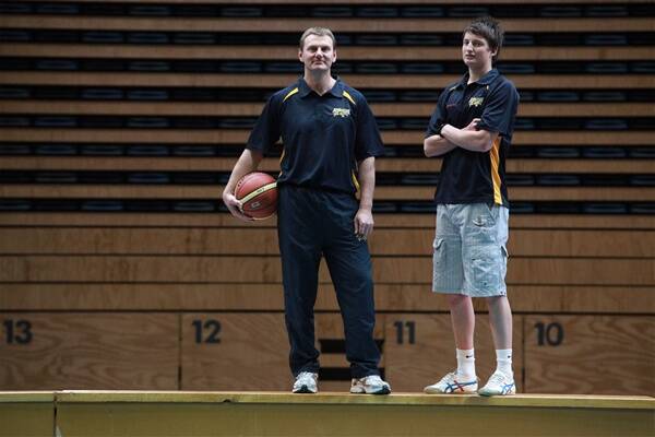 NEW VISION: Ballarat Miners head coach Guy Molloy with newest recruit Shaun Bruce at the Minerdome. Picture: Andrew Kelly