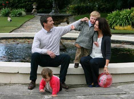 Crown Prince Frederik and Crown Princess Mary of Denmark with their children, Prince Christian and Princess Isabella, at Government House this morning.