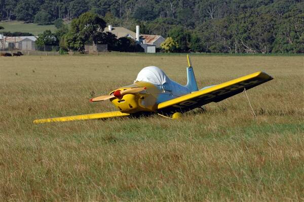 CLOSE CALL: A pilot had a lucky escape after being forced to land his small aircraft in a paddock at Mollongghip yesterday afternoon. Picture:  Zhenshi van der Klooster