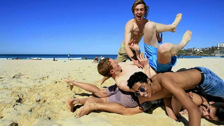 Flexing it on Bondi Beach. Photo: James Alcock