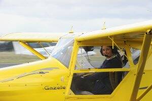 GOING SOLO: Anna Tuncks, 15, heads out on her maiden solo flight. Picture: Jeremy Bannister