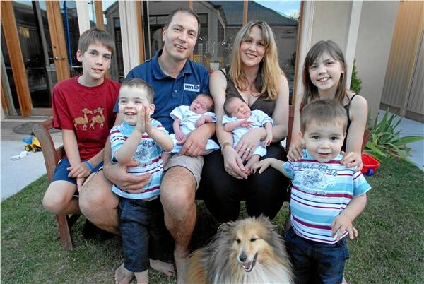 NEW ADDITIONS: The Matkov family from left, Jye, 11,  Liam, 2, Tony and Lessa with three-week-old  Mitchell and Lachlan, Cayla, 9, and Damon, 2.