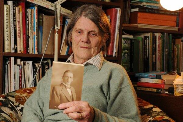 Julia Richardson with a photograph of her father. Picture: Justin Whitelock