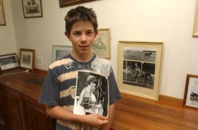 HEARTBREAK: Samuel Payne with a picture of his mum, Brigid, yesterday.