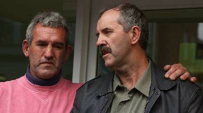 DISTRAUGHT: The brothers of Anne Ervin, Peter Fitzpatrick, left, and Gerard Fitzpatrick speak about the accident.