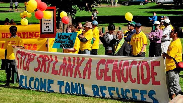 Tamil protestors demonstrated outside the MCG for the start of the Boxing Day test.