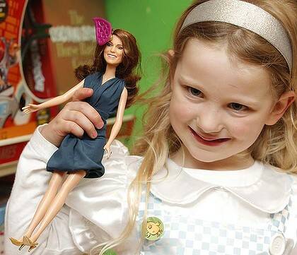 Five year old Amy Hendriksen poses with the limited edition  Princess Catherine Engagement Doll  during its launch at Hamleys toy shop in London.