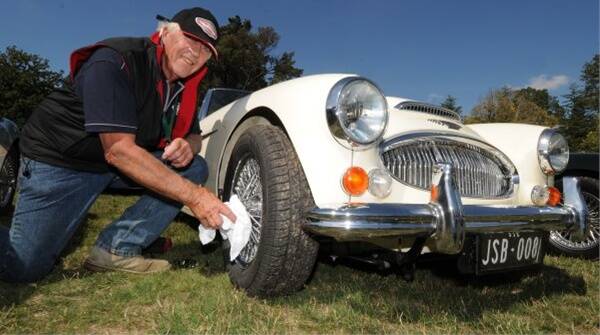 John Birdsey polishes his car during the Austin Healey Owners Club national rally in Ballarat and Creswick at the weekend. The 2010 National Humber Rally was also staged in Ballarat during Easter. Picture: Lachlan Bence