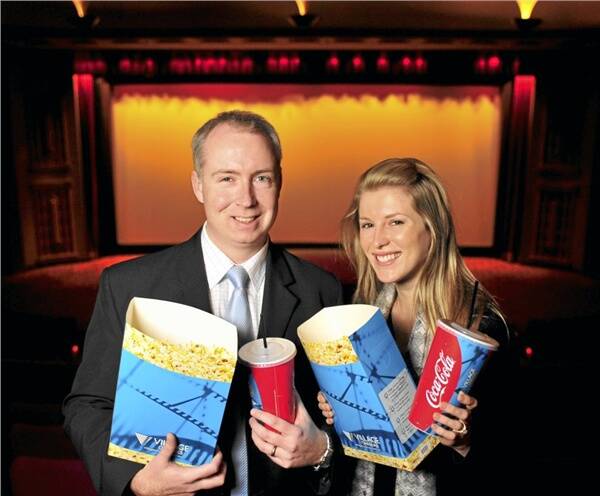 POPCORN ANYONE?: Regent Cinema's Christopher Jones and Shona Gull gear up for the new  3D theatre.