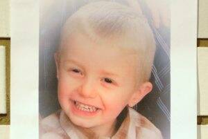 TRAGIC: A picture on a wall of Ethan, the little boy who died from severe injuries after he was hit by a train.