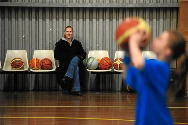 COURTSIDE: Sarah-Jayne Maywald watches her daughter Kurstin participate in the basketball clinic.
