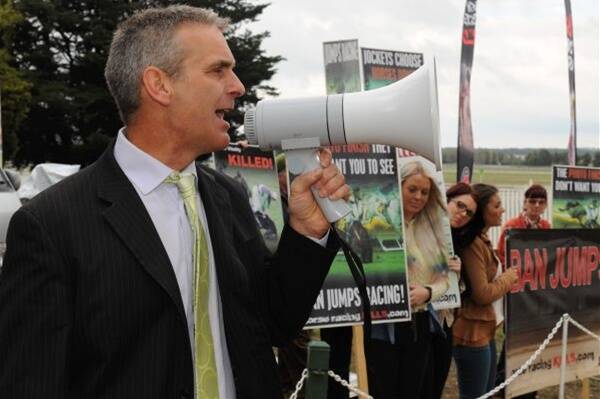 LOUD: Coalition for the Protection of Racehorses campaign manager Elio Celotto protests about jumps racing at Ballarat Turf Club's first jumps racing meet since 2009. Photo: Lachlan Bence.