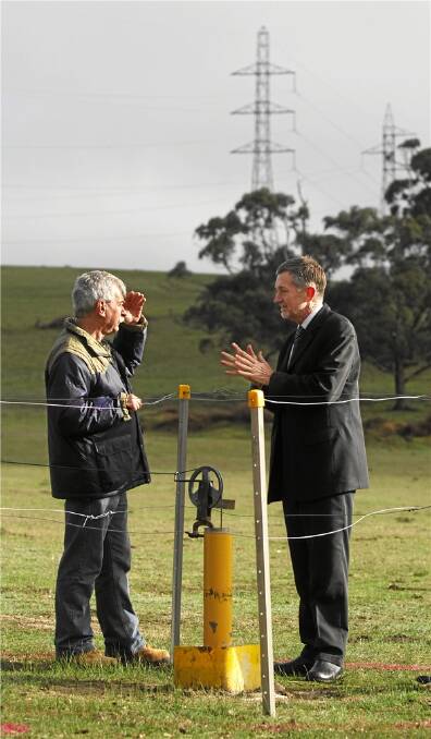 TEST SITE: Geoscience Victoria's principal geologist Bob Kitch, left, and Energy and Resources Minister Peter Batchelor  inspecting the site at Scotsburn yesterday.