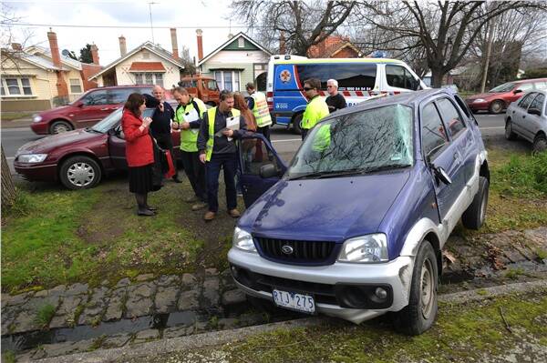 AFTERMATH: This car driven by Ballarat lawyer Jon Irwin was involved in a rollover yesterday. Picture: Andrew Kelly