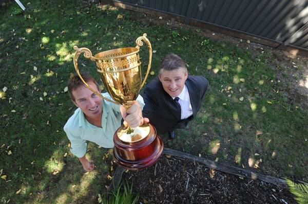 WINNERS: Ballarat owners Tony White and Darren Fraser proudly show off the Pakenham Cup. Picture: Andrew Kelly