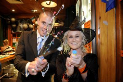 PARTYTIME: Gordon Murray and Emma Williams celebrating at Irish Murphy's.