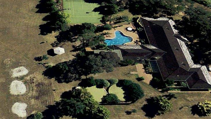 An overhead view of the mansion, complete with an eight-hole golf course.