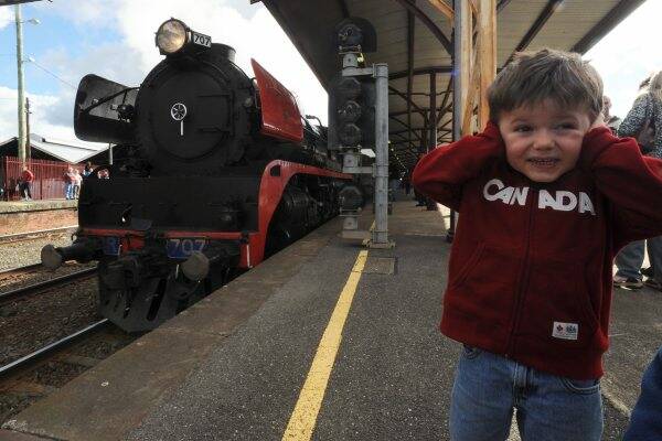 Tanner Versloot covers his ears against the noise of the steam escaping at a previous Ballarat Heritage Weekend.