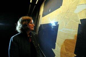 RETURN: Artlab principal conservator Kristin Phillips inspects the Eureka Flag which is back at the Art Gallery of Ballarat. Picture: Jeremy Bannister