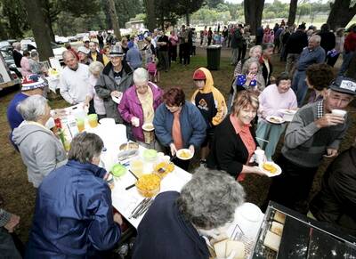 Lining up for a feed at the Australia Day Breakfast in Creswick
