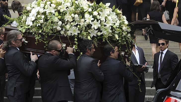 Mourners attend the funeral of James Miller at St Marys Cathedral Sydney.