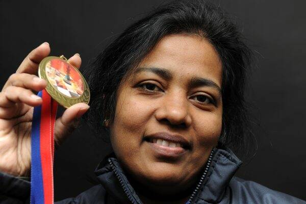 Chess champion Vineetha Wijesuriya proudly displays the medal she won at the recent Asian Amateur Titles in Sydney.