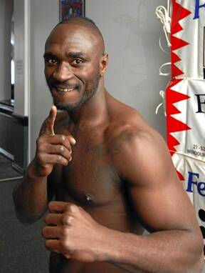UNPREDICTABLE: Congo-born boxer Sonni ``Michael'' Angelo has some fun at yesterday's weigh-in for tonight's fight.