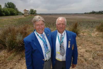 RETURN VISIT: Members of the 1956 Italian rowing team Cosimo Campioto and Antonio Casuar gather at a dry Lake Wendouree yesterday to celebrate the anniversary of the Olympics Games.