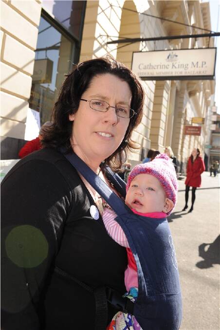 CONCERN: Faye Kricak and baby Harlei Kricak outside the office of Ballarat MHR Catherine King to protest about the end of homebirths. Photo: Lachlan Bence
