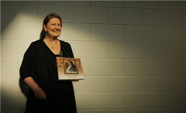 LECTURE: Local historian Dorothy Wickham, with her newly released book Women of the Diggings: Ballarat 1854, at last night's lecture. Picture:  Daniel Hartley-Allen