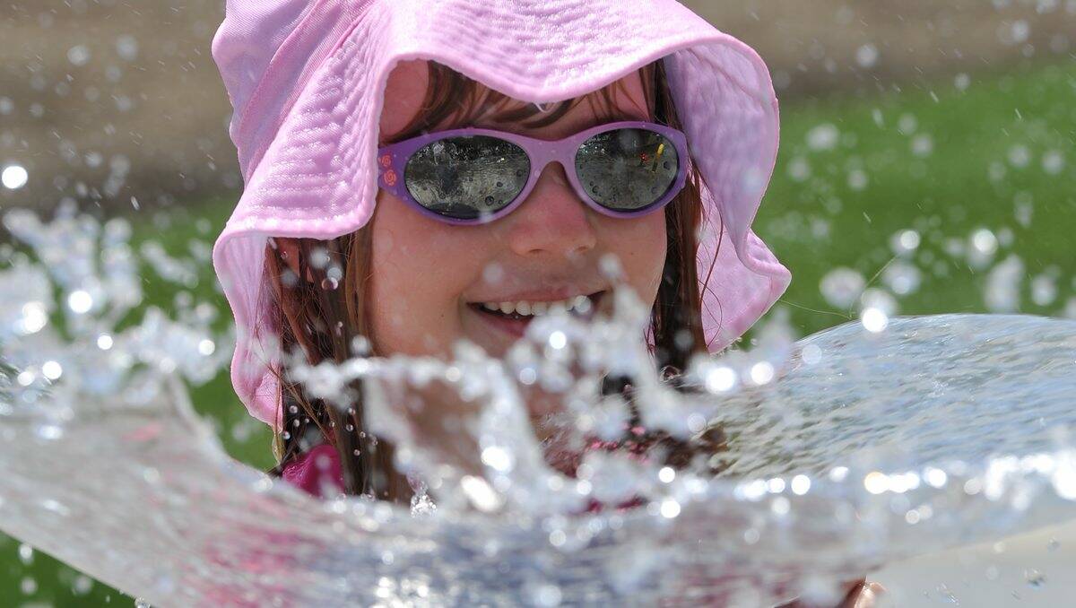 SPLASHING AROUND: Emma Allen, 6, has fun in the sun at Doveton Street's new Water Park. PICTURE: LACHLAN BENCE