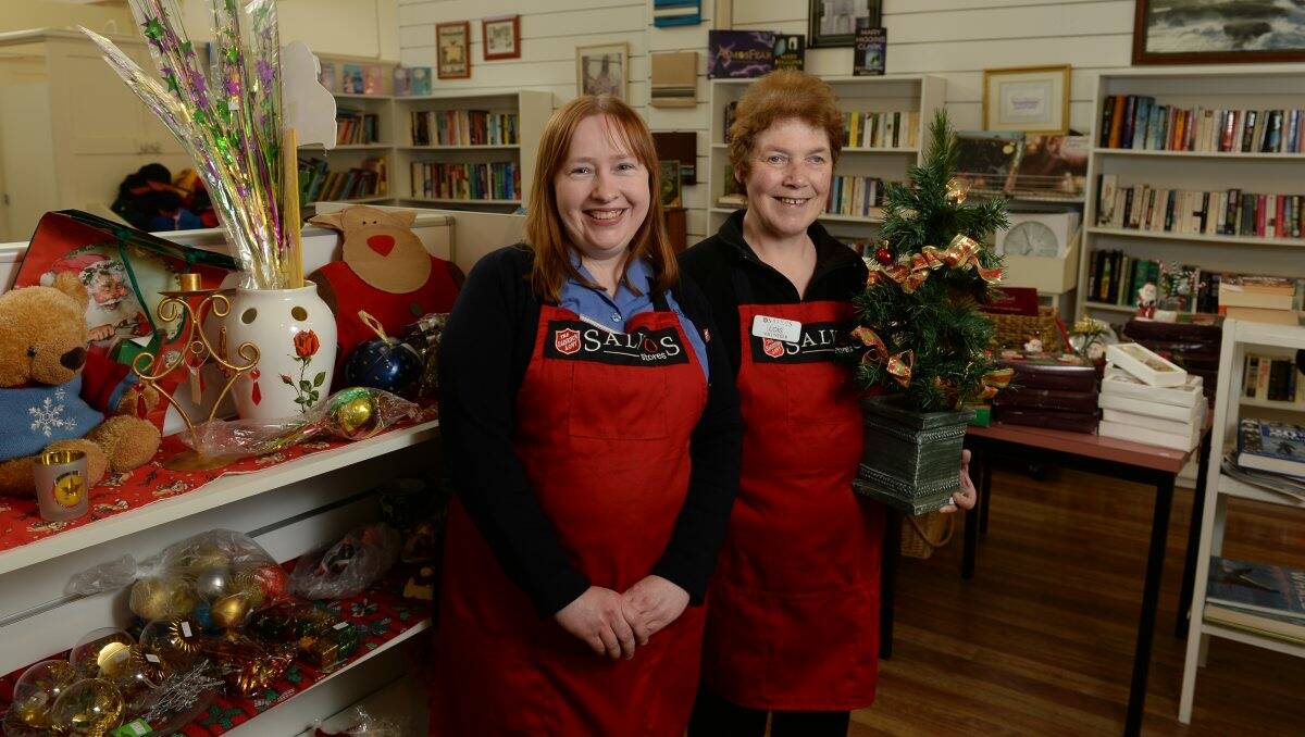 Tough times: Salvos’ store manager Kirsten Hippisley and volunteer Lois Westwood are busy in the lead-up to Christmas. PICTURE: ADAM TRAFFORD