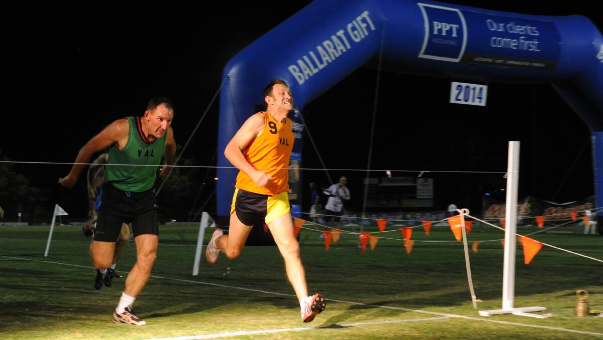 Mark Howson only just wins in front of Peter Biggs in the 300m Vets Final . Picture: Justin Whitelock 