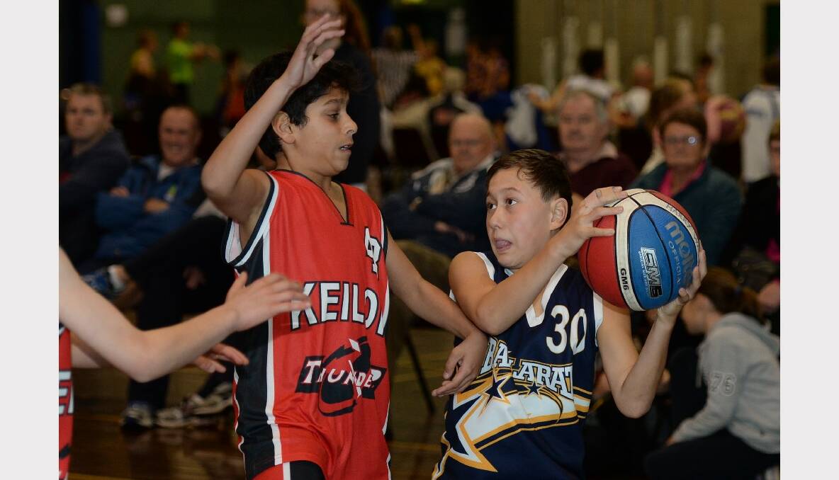 Junior Basketball Tournament. Under 12B1 boys - Ballarat Gold v Keilor. Marcus Eid (Keilor) and  Brock Noble (Ballarat Gold). PICTURE: KATE HEALY