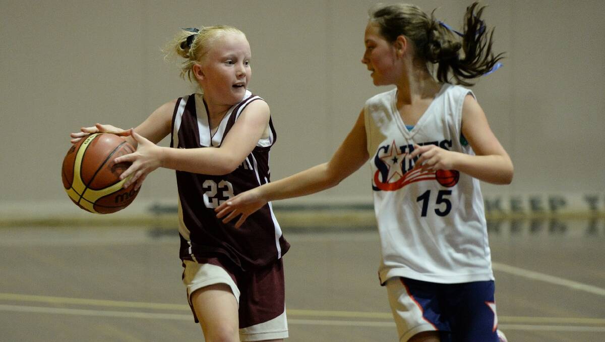 12A Girls Basketball. Zali Clark, Exies Amcy and Elissa Dunn, Saints Fever. PIC: KATE HEALY
