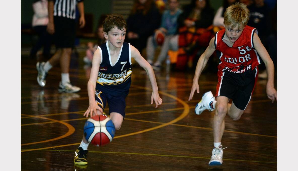 Junior Basketball Tournament. Under 12B1 boys - Ballarat Gold v Keilor. Tyson Marnell (Ballarat Gold) and Zac Blythe (Keilor). PICTURE: KATE HEALY